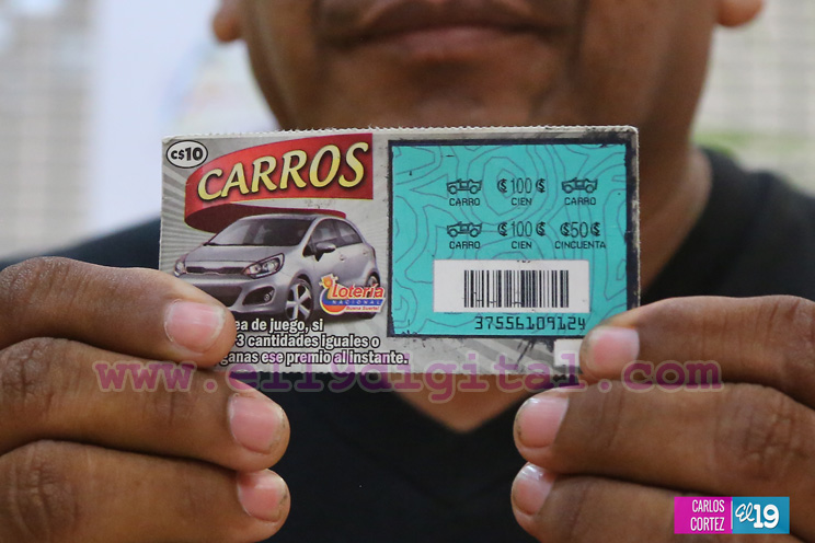 Lotería Nacional entrega utilidades a MiFamilia y al IND  