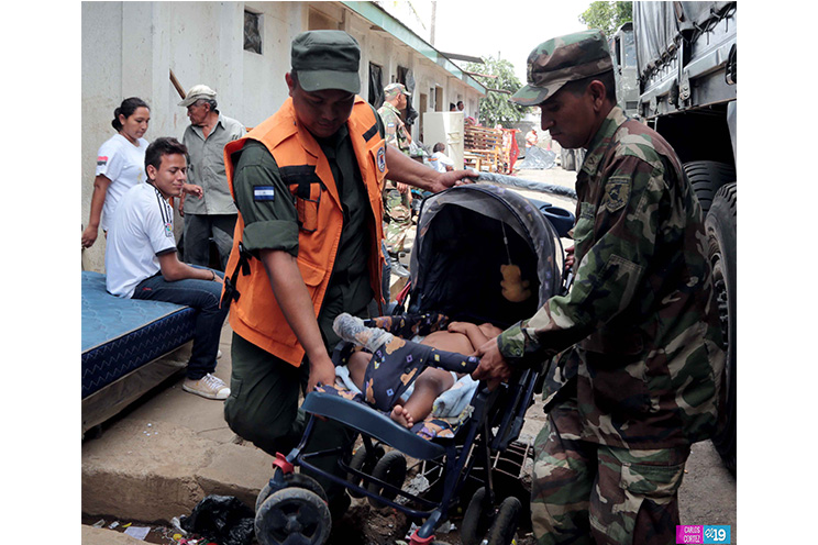 Realizan traslado de familias a Ciudad Belén