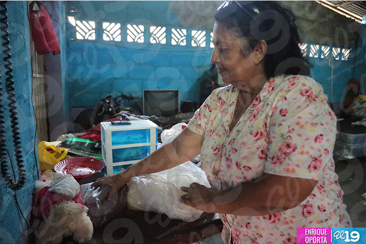 Familias del Distrito III protagonistas de entrega de paquetes alimentarios